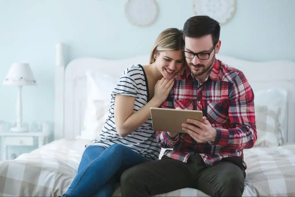 A man and woman looking at their memories 