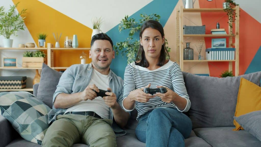 A couple playing a video game together