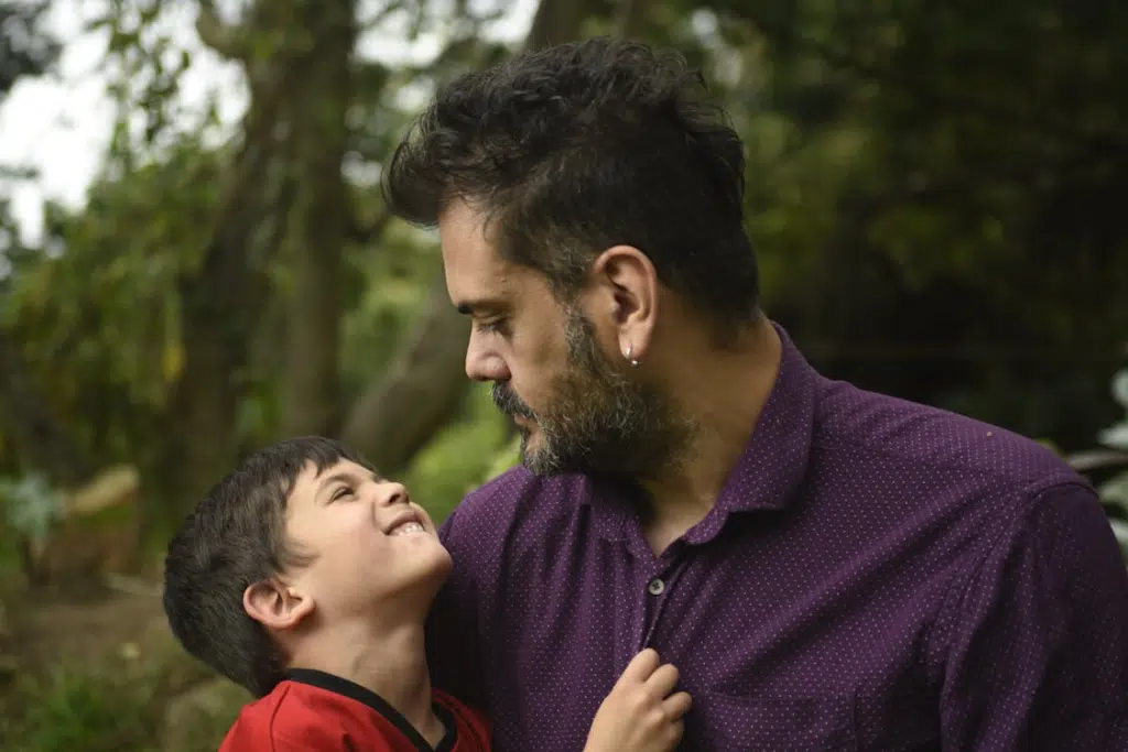 Man Holding Boy