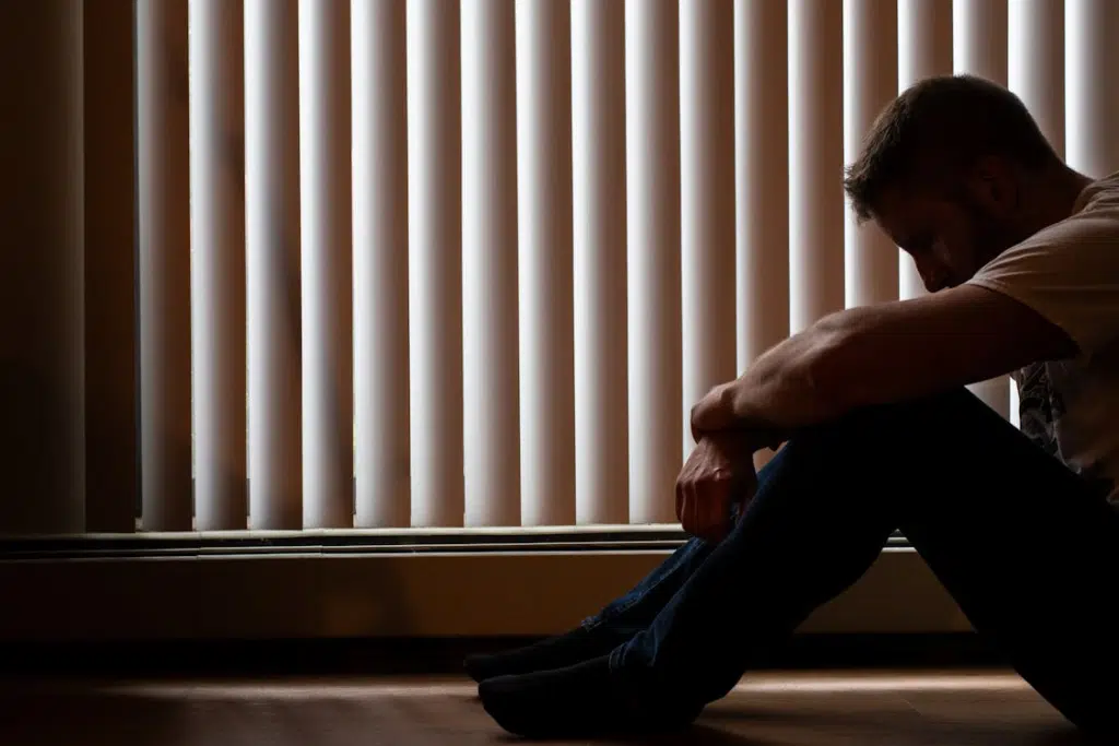Silhouette of man sitting