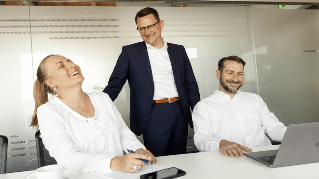 Colleagues laughing together