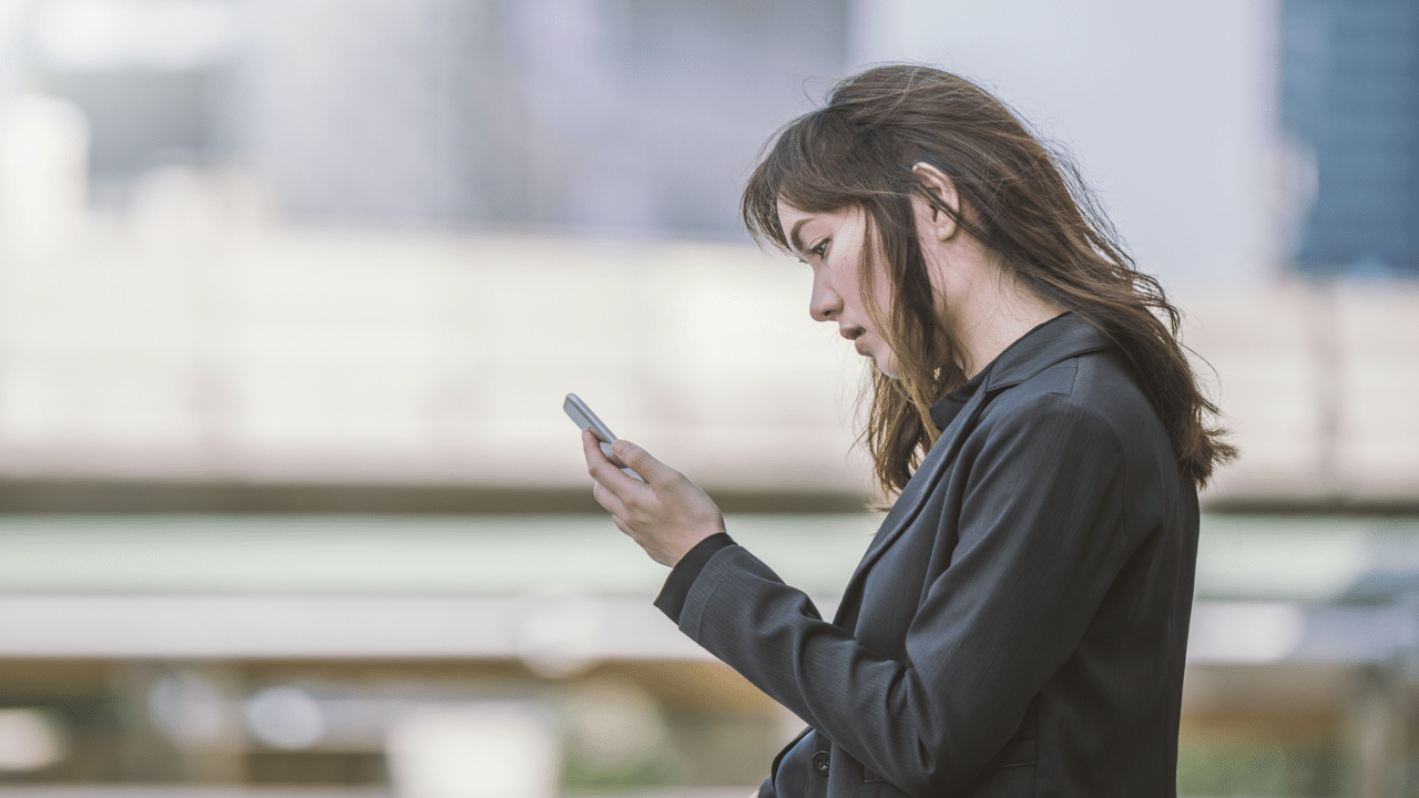 A woman overthinking a text