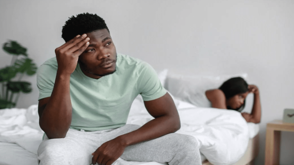 A couple ignoring each other in the morning