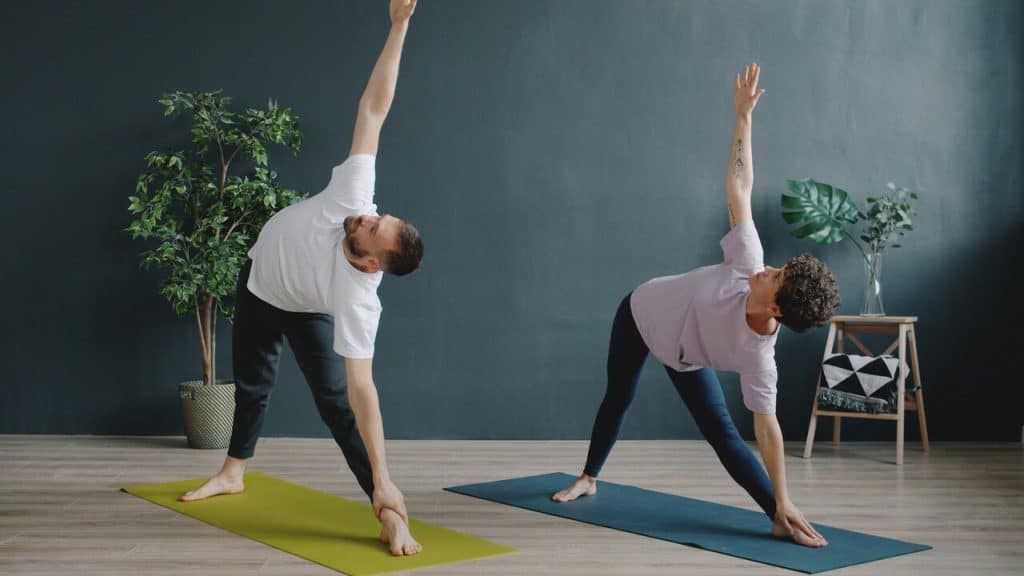 A couple doing yoga together