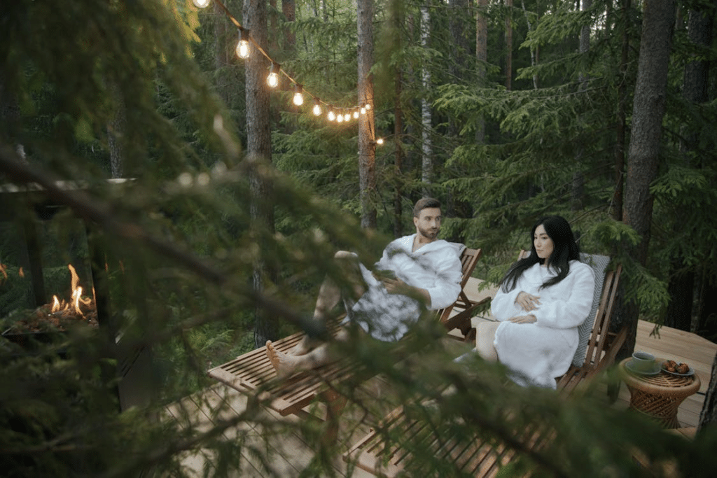Couple Sitting on Brown Wooden Bench
