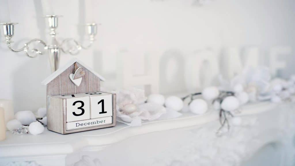 Calendar on a winter-themed mantel 