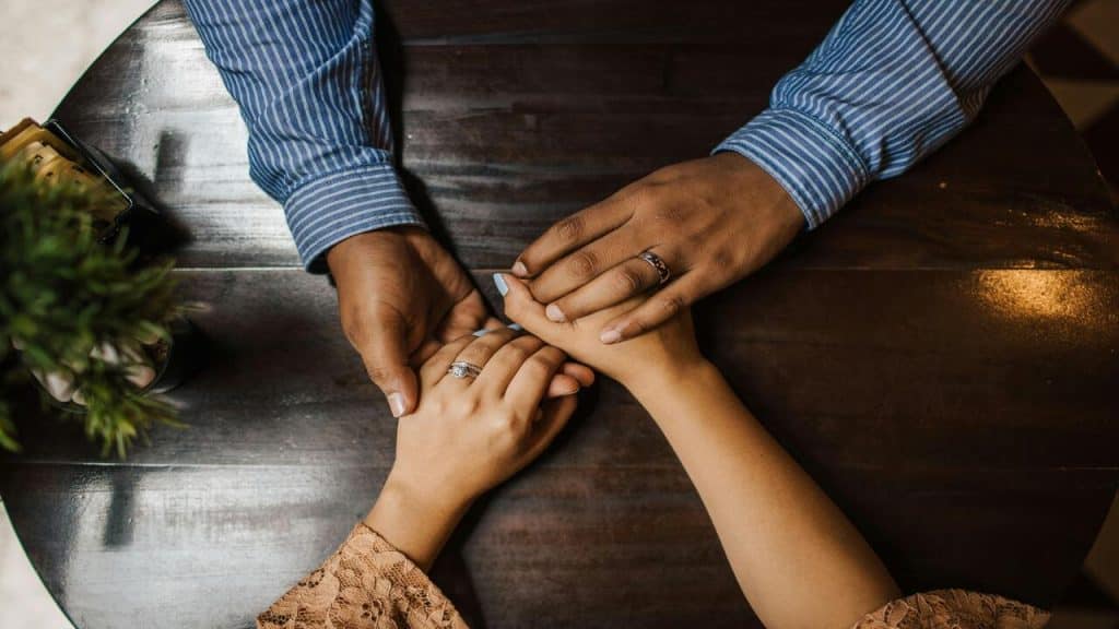 A couple holding hands
