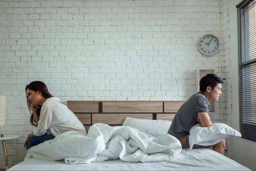 A man and woman not talking to each other