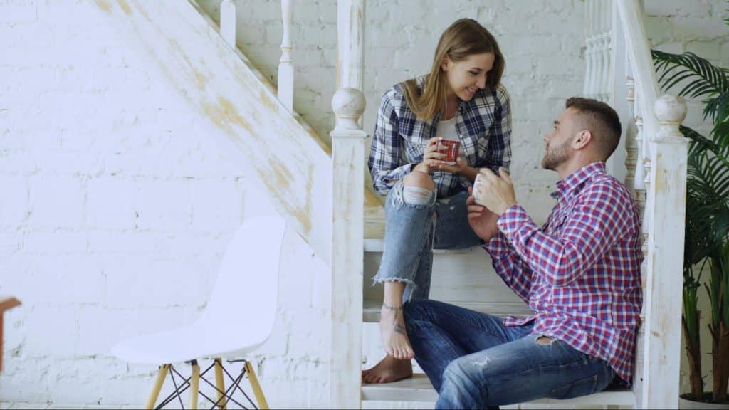 A man and woman at the stairs