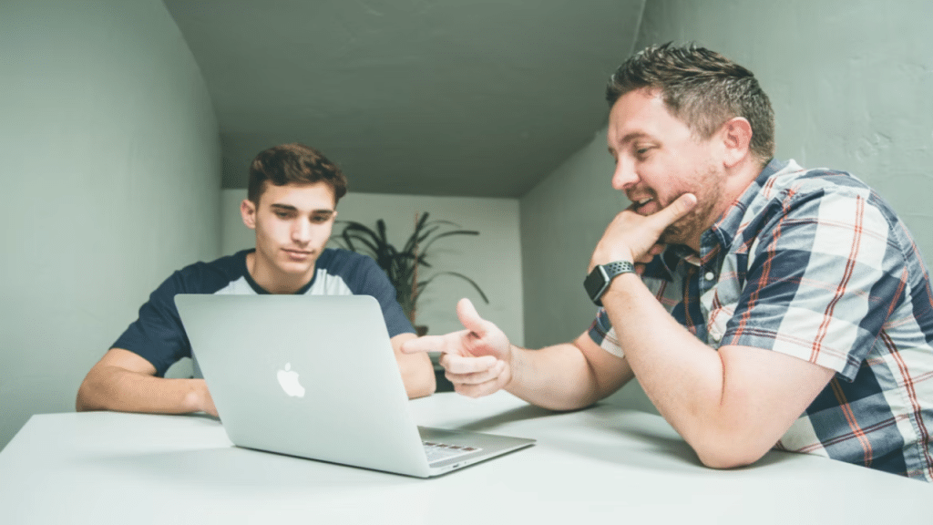 A man mentoring a younger guy