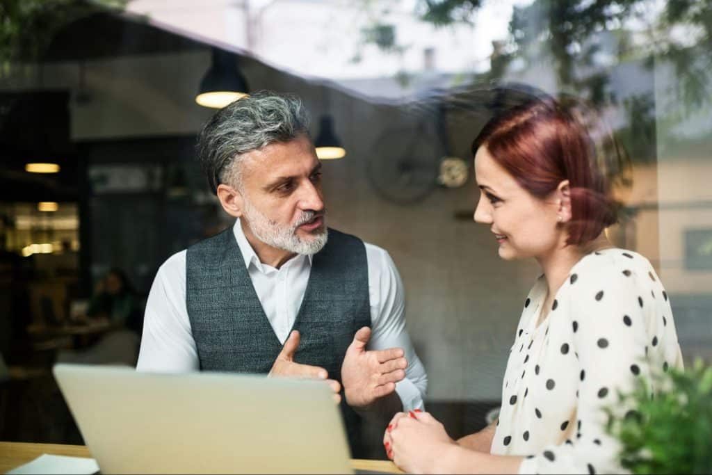 A man and woman talking