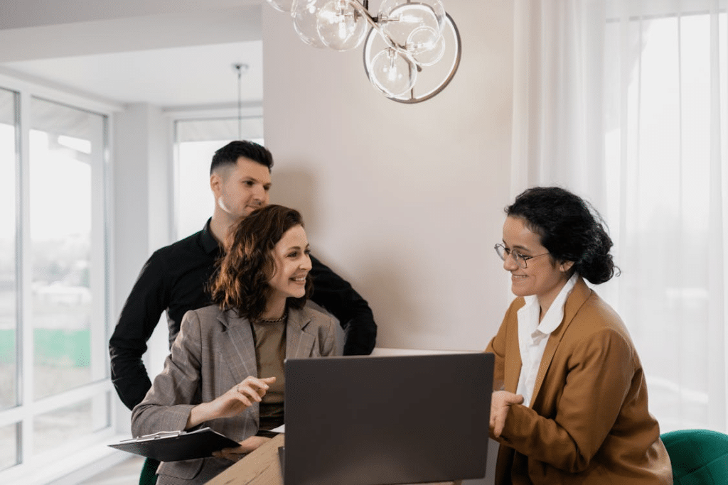 A couple talking to an agent