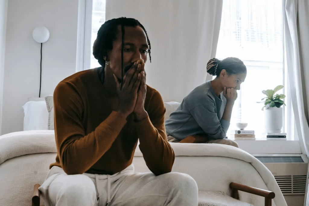 A sad couple in the bedroom