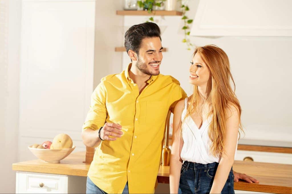 A man checking on a woman