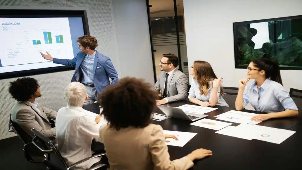 A man leading a business meeting