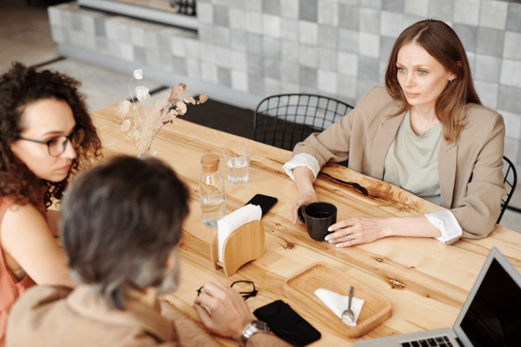 People Having a Meeting at the Coffee Shop