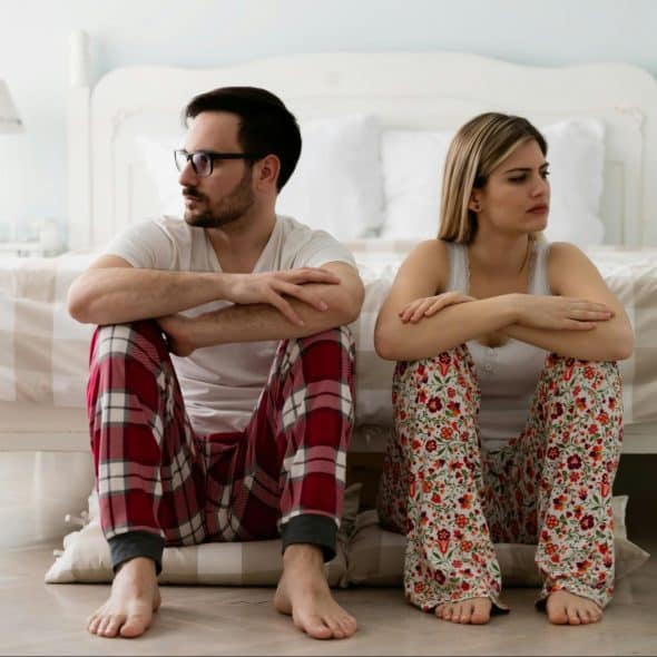 A man and woman not talking to each other