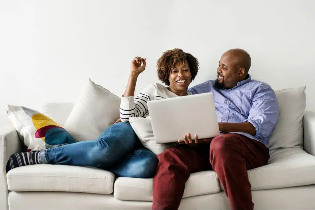 A man and woman at the sofa
