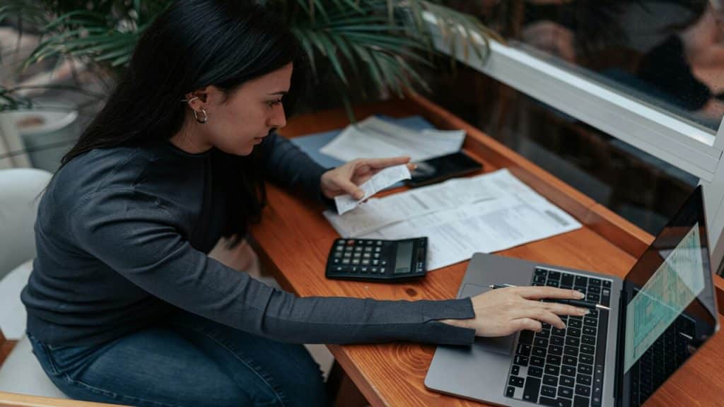 A woman doing the bills 