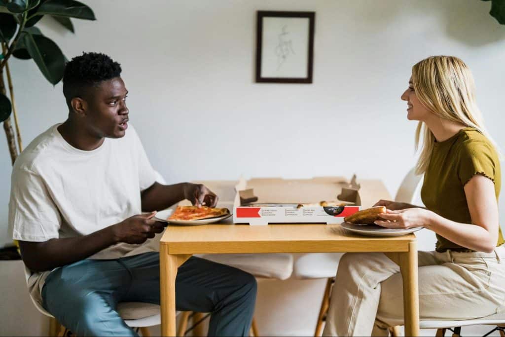 A man and woman having a lunch together