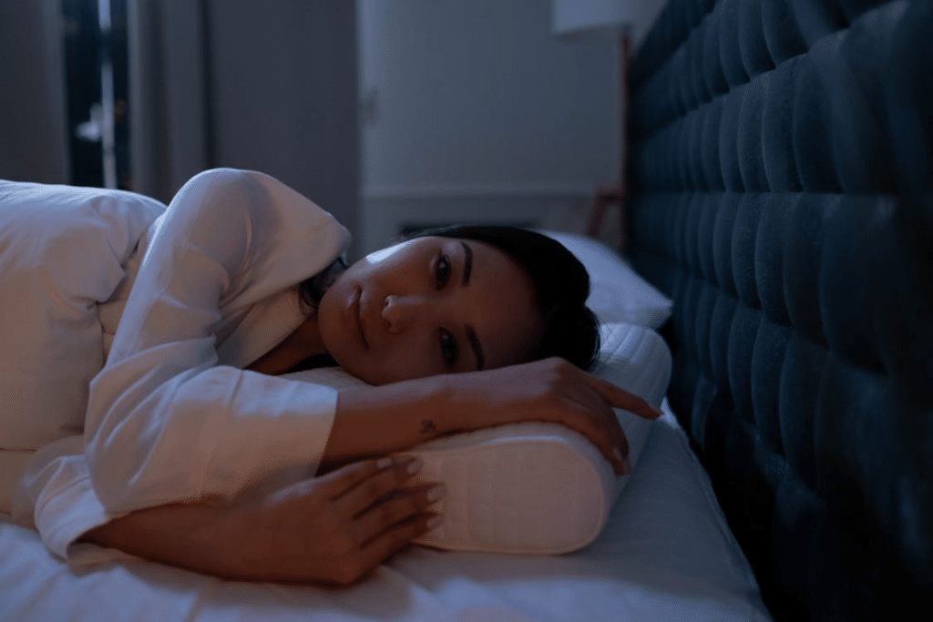 A woman lying in bed