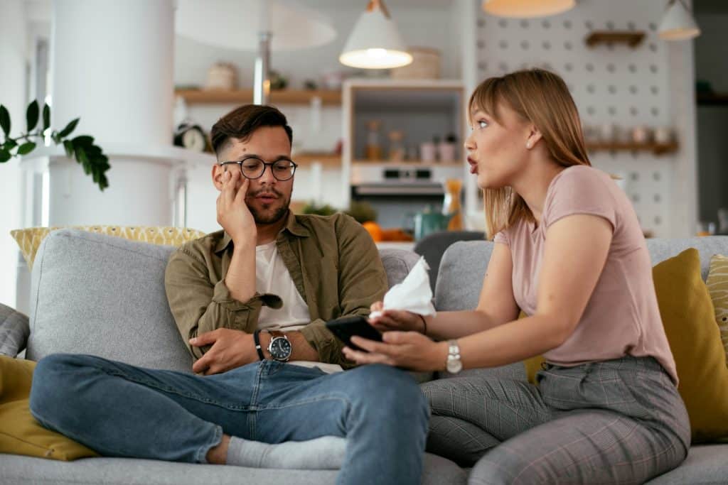 The woman is yelling at her boyfriend.