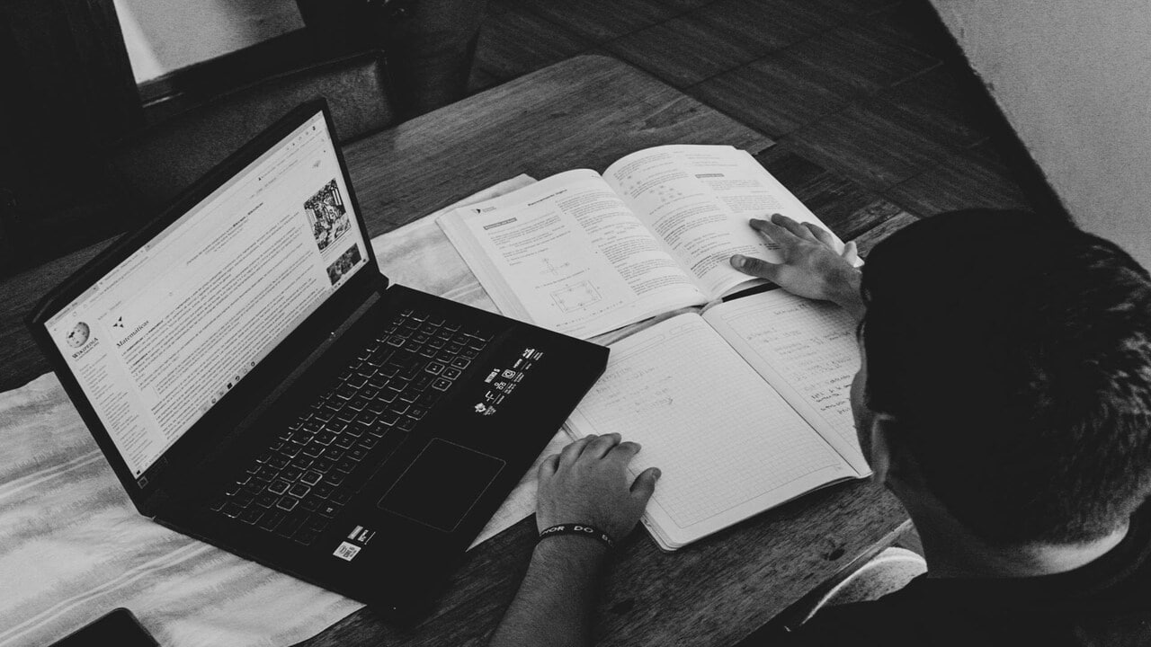 A photo of a man studying