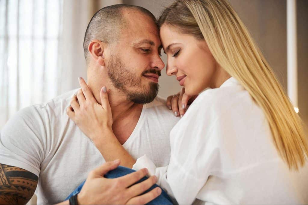 A man and woman close to each other