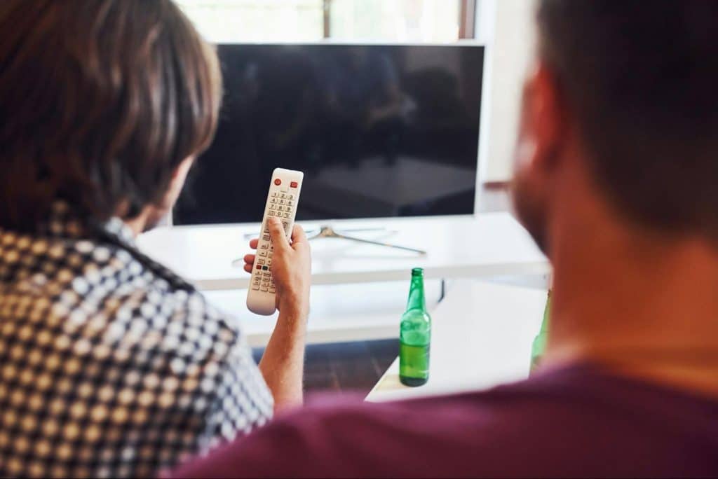 A woman holding a controller