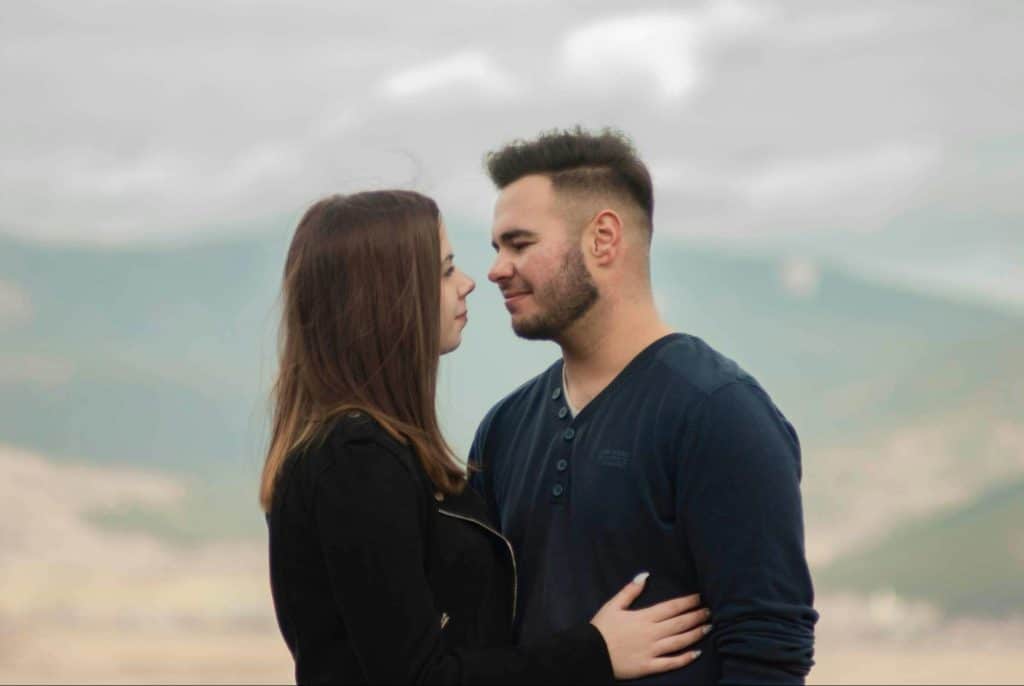 A man and woman looking at each other