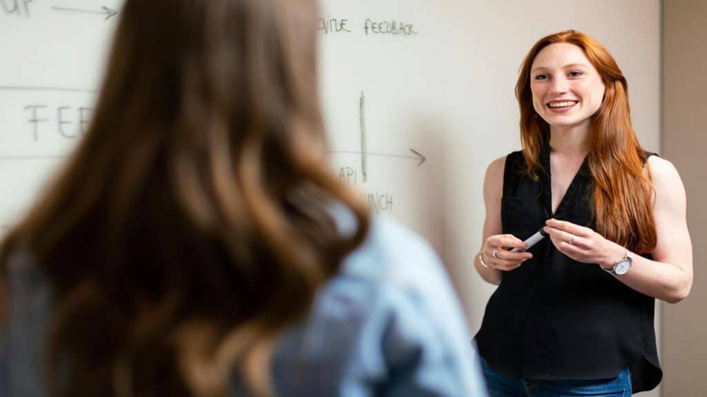 A woman leading a business presentation