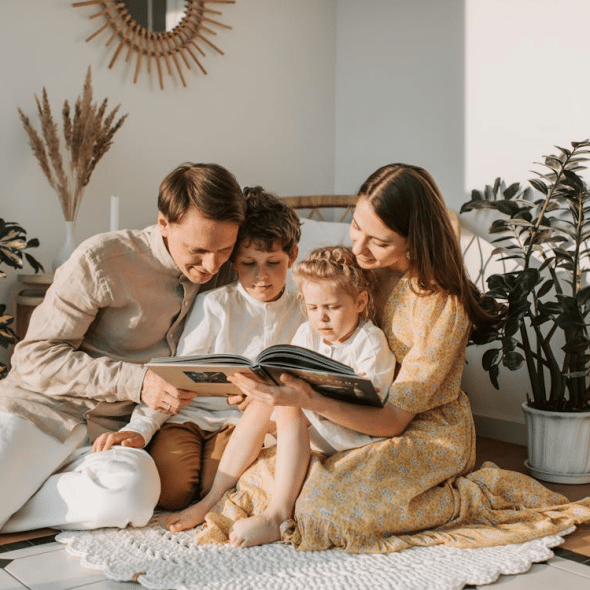 A family reading a book
