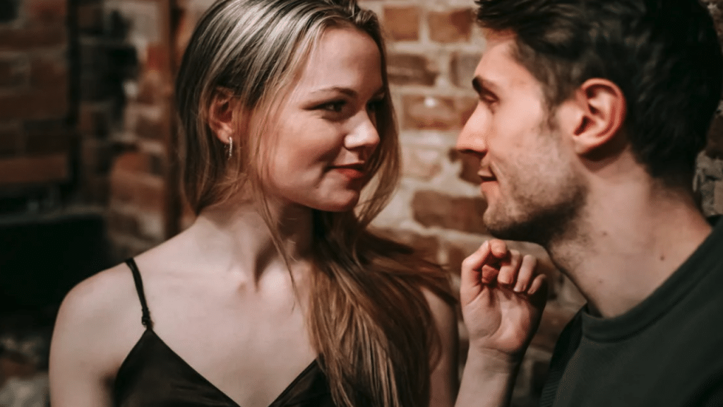 A couple looking at each other during their date