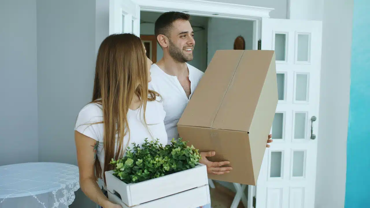A couple moving into a new home