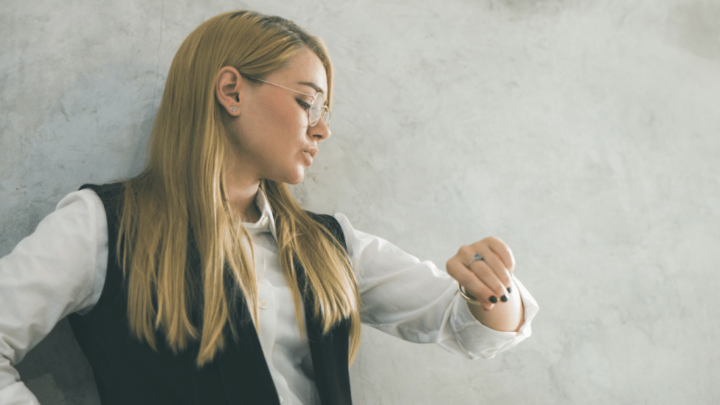 A woman checking the time