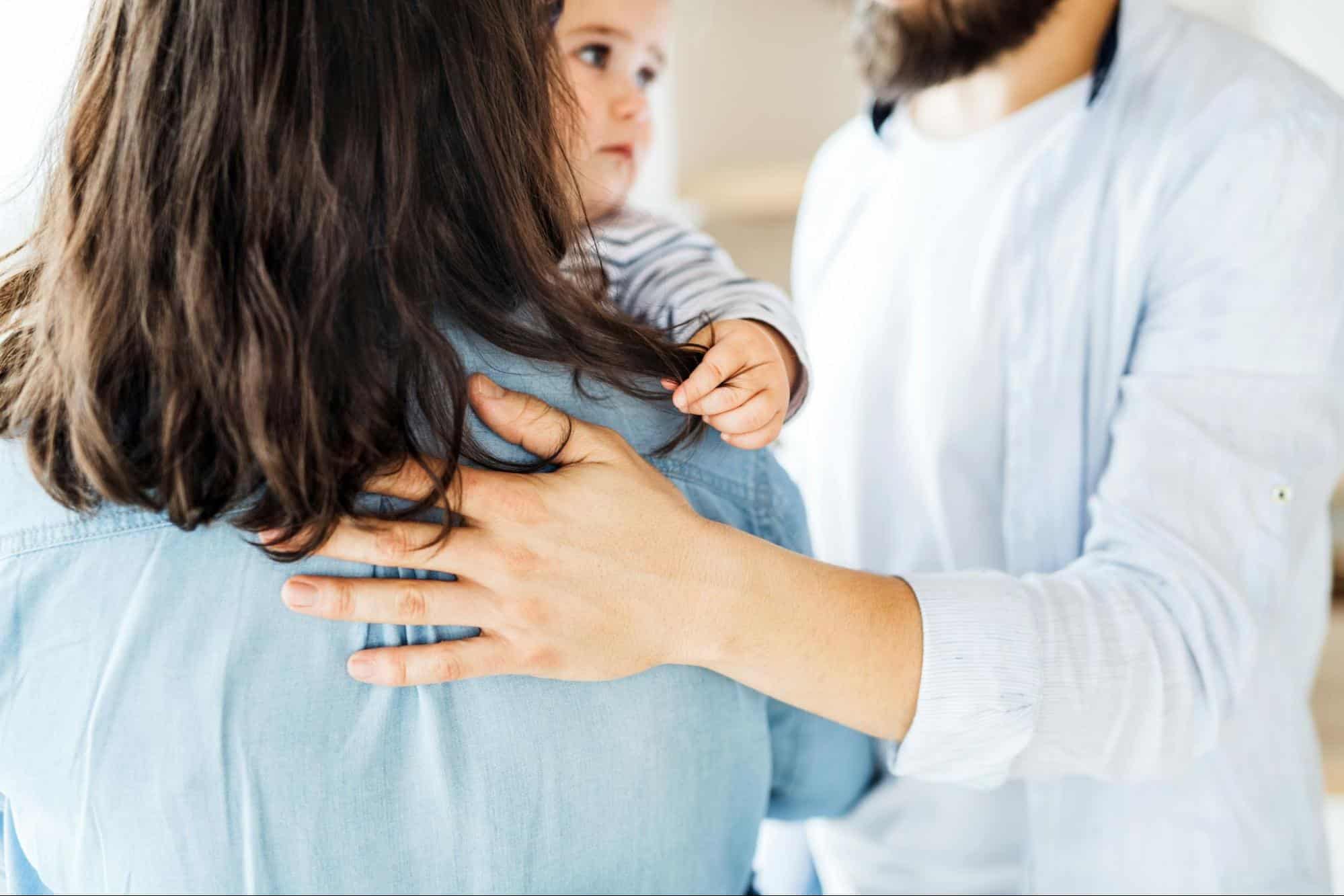 A man and woman with their child 
