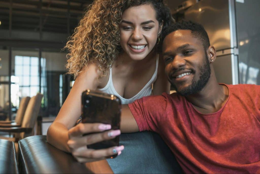 A man and woman  smiling