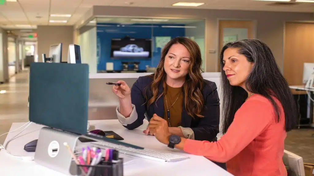 Two female colleagues working together