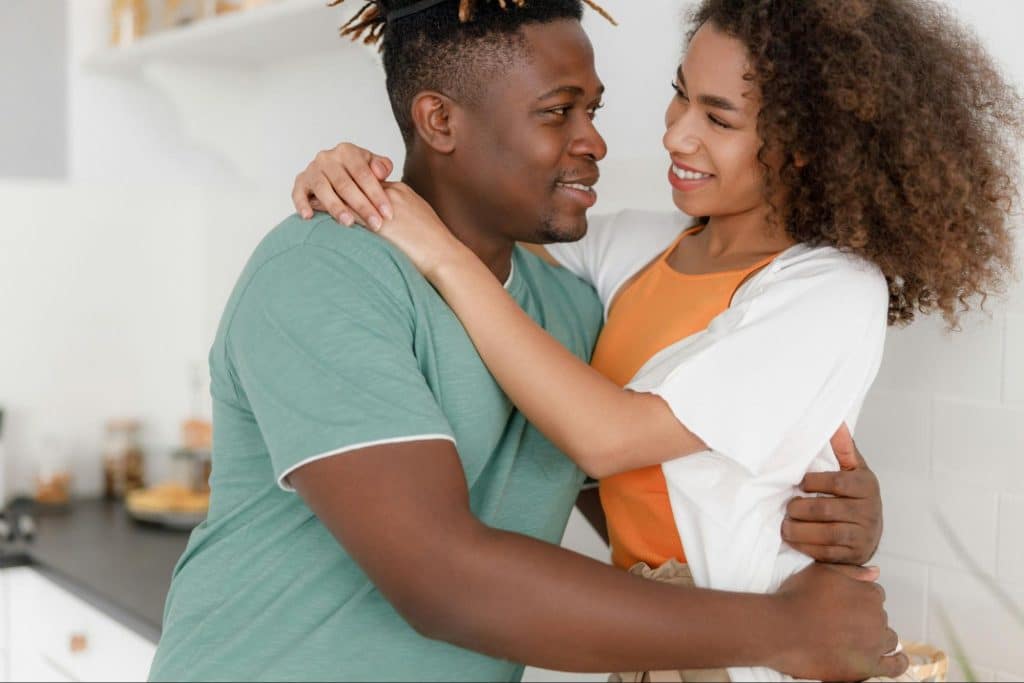 A man and woman looking at each other