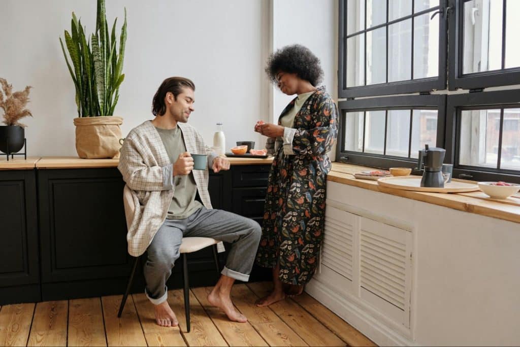 A man and woman having a peaceful breakfast together