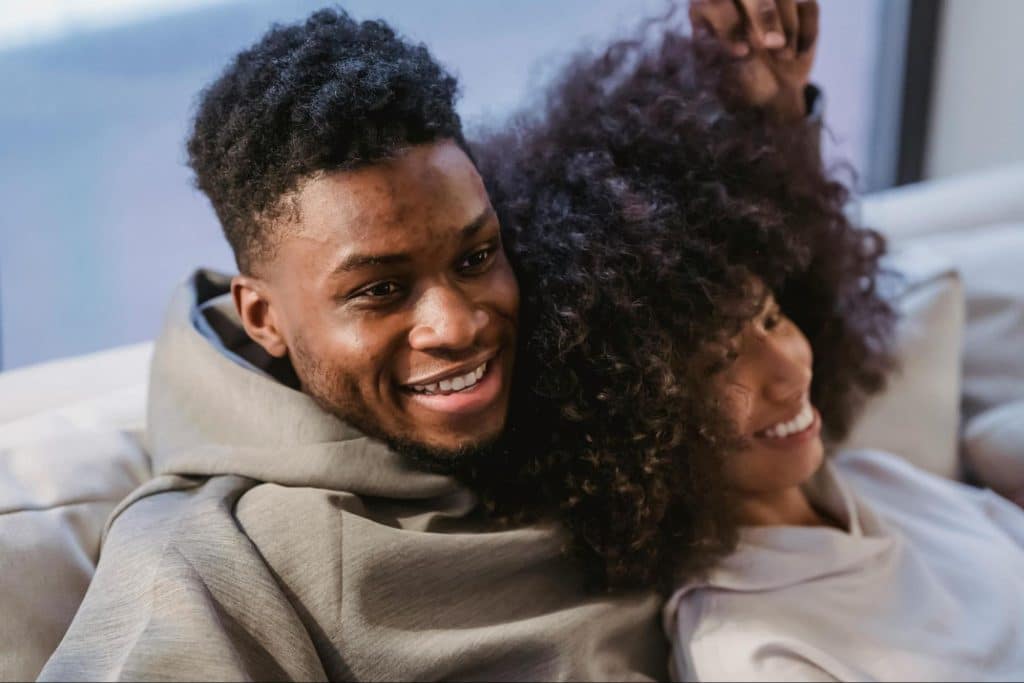 A man and woman laughing together