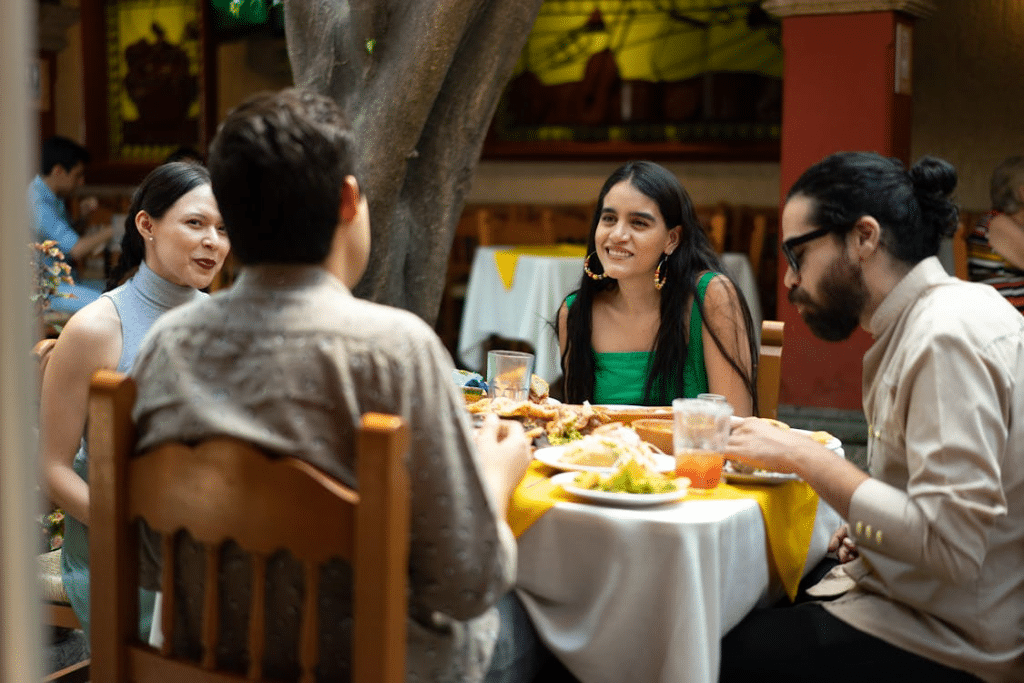Group of Friends Eating at Mexican Restaurant