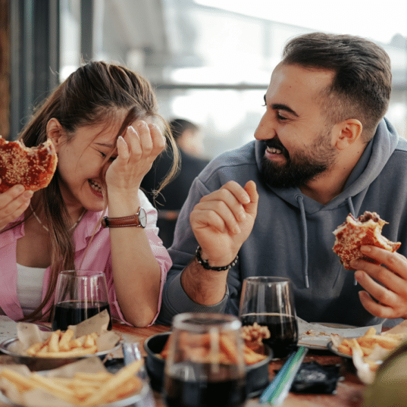 A couple laughing during their date