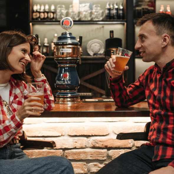 A couple having beer during a date