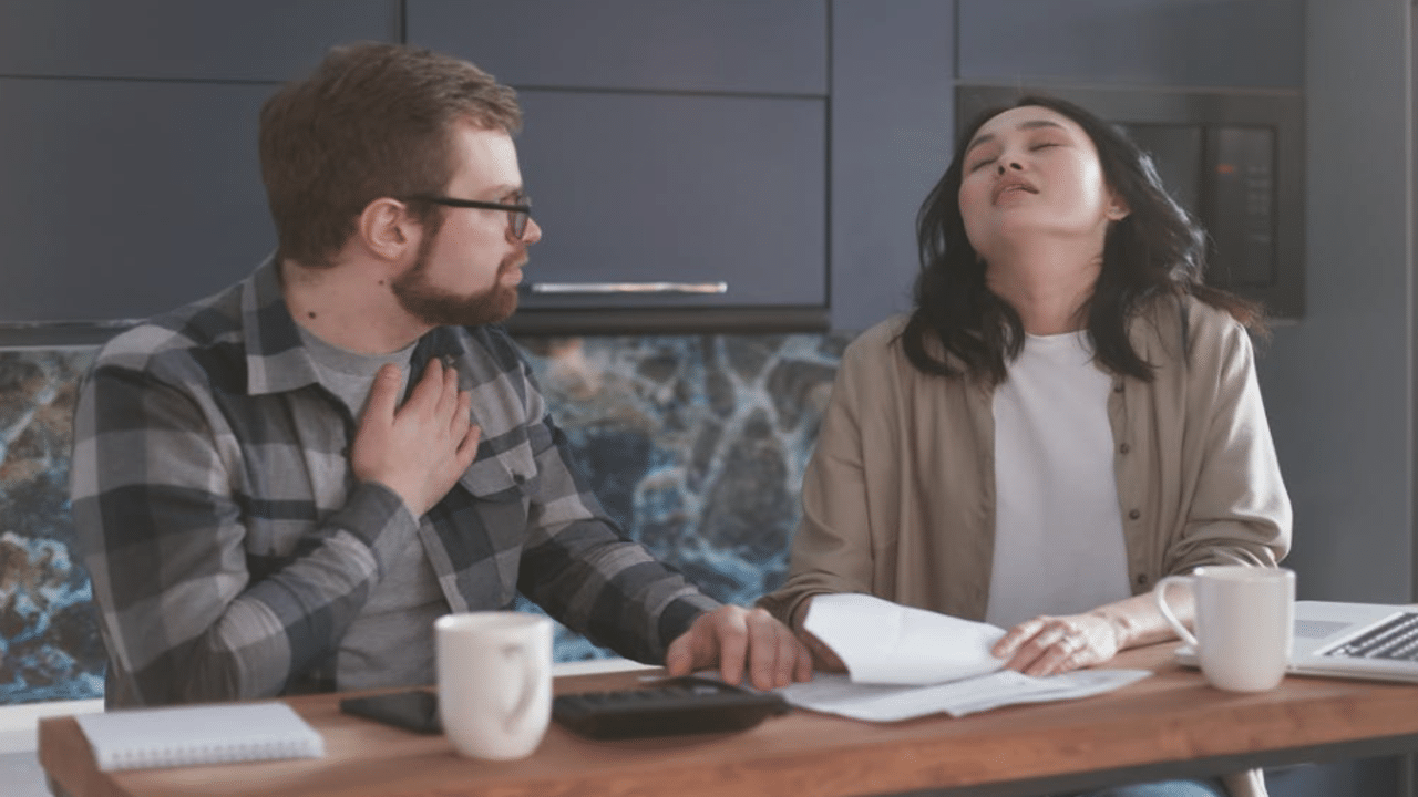 A couple looking stressed about the bills 