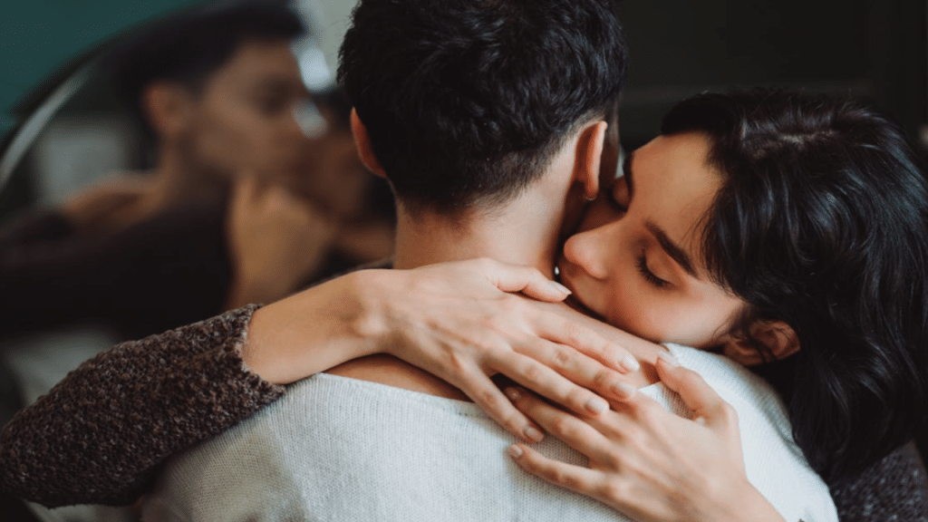 A couple hugging at home