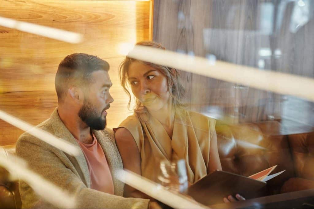 A man and woman looking at each other