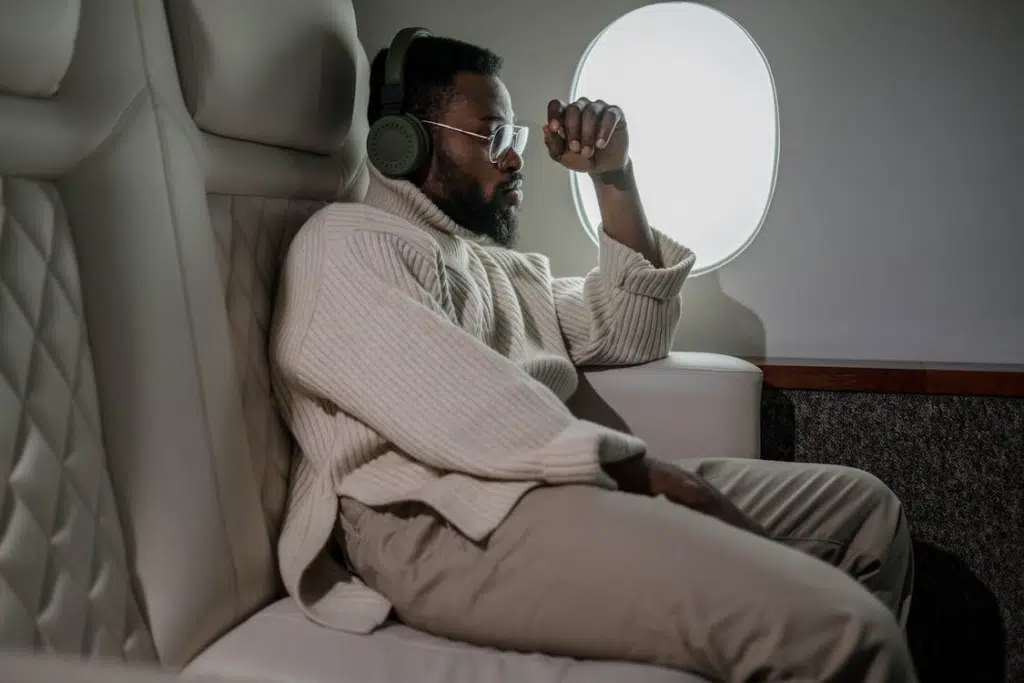 Man Sitting Near the Airplane Window