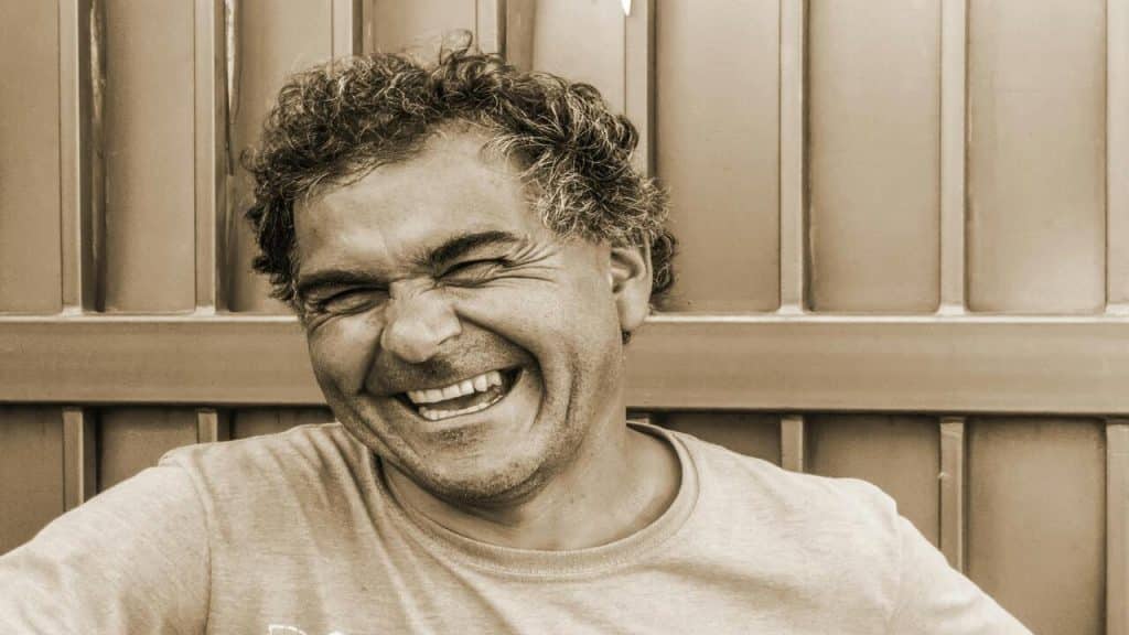 A man smiling at the camera