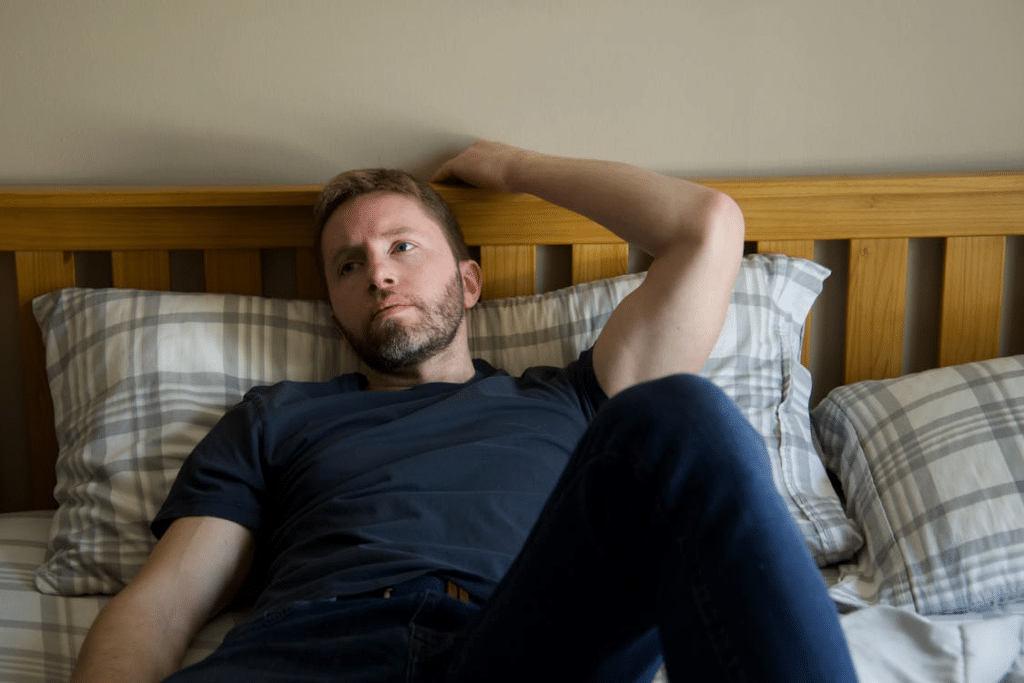 Man Lying in Bed